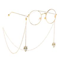 Gold-colored metal non-slip chain, with pendant kitten, for glasses and masks GL247