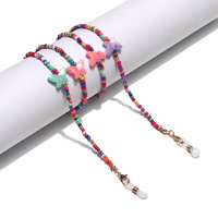 Металлическая цепочка для очков с цветными маленькими подвесками в виде ромашек GL1366