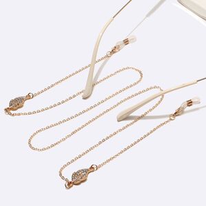 Gold-colored metal non-slip chain, with leaves with rhinestines, for glasses and masks GL1454
