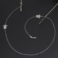 Silver-colored metal non-slip chain, with pendant turtle, for glasses and masks GL237