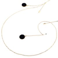 Gold-colored metal non-slip chain, with a black fur ball pendant, for glasses and masks GL008