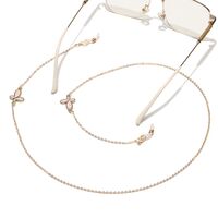 Gold-colored metal non-slip chain, with pink butterfly, for glasses and masks GL1513