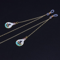Gold-colored metal non-slip chain, with pendant light bulb, for glasses and masks GL912