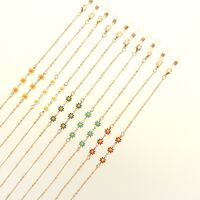 Gold-colored metal non-slip chain, with multicolored daisy, for glasses and masks GL1876