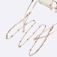 Gold-colored metal non-slip chain, with pearl and oval, for glasses and masks GL1719