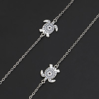 Silver-colored metal non-slip chain, with pendant turtle, for glasses and masks GL237
