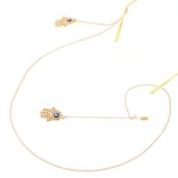 Gold-colored metal non-slip chain, with pendant palm and rhinestone, for glasses and masks GL245