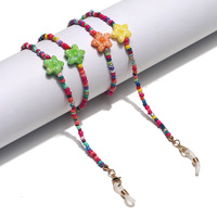 Металлическая цепочка для очков с цветными маленькими подвесками в виде ромашек GL1366