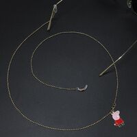 Gold-colored metal non-slip chain, with piglet, for glasses and masks GL478