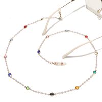 Gold-colored metal non-slip chain, with colored glass and pearl, for glasses and masks GL1542