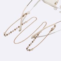 Gold-colored metal non-slip chain, with beads, for glasses and masks GL1621