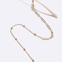 Gold-colored metal non-slip chain, with pearl and oval, for glasses and masks GL1719