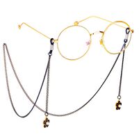 Black-colored metal non-slip chain, with pendant black flower and pearl, for glasses and masks GL490