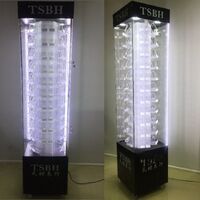 Стойка-витрина акриловая напольная вращающаяся для очков, оправ, футляров и аксессуаров на 120 мест 18011