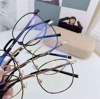 Оправа металлическая, линзы с Blue Block покрытием SANTA 1932