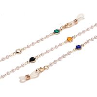 Gold-colored metal non-slip chain, with colored glass and pearl, for glasses and masks GL1542
