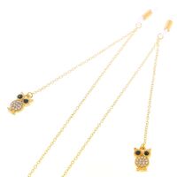 Gold-colored metal non-slip chain, with pendant owl and rhinestone, for glasses and masks GL253