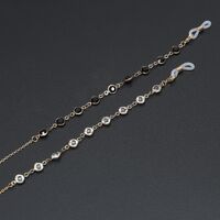 Gold-colored metal non-slip chain, with black and white glass beads, for glasses and masks GL336