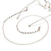 Gold-colored metal non-slip chain, with black rhinestone, for glasses and masks GL1441
