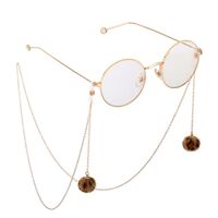 Gold-colored metal non-slip chain, with a leopard-colored fur ball, for glasses and masks GL760