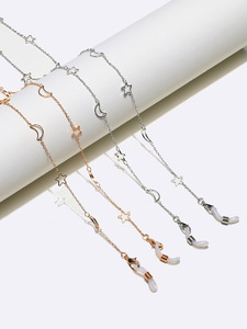 Set of two gold and silver glasses chain with hollow moons and stars GM063(1)