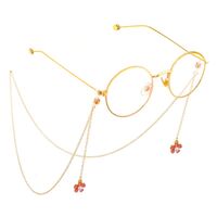 Gold-colored metal non-slip chain, with a flower and pearls, for glasses and masks GL564