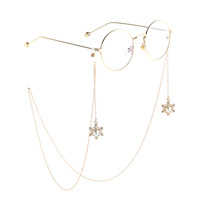 Gold-colored metal non-slip chain, with pendant snowflake with pearl, for glasses and masks GL826