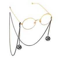 Black-colored metal non-slip chain, with pendant bowknot with rhinestone, for glasses and masks GL605