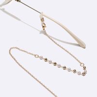 Gold-colored metal non-slip chain, with beads, for glasses and masks GL1621