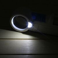 Magnifier with universal backlight, magnifying glass with handle 7011-XX, diameter 38 mm, magnification: 12Х