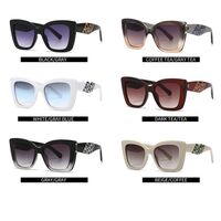 Plastic sunglasses in the shape of a 