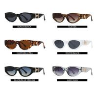 Plastic sunglasses in the shape of a 