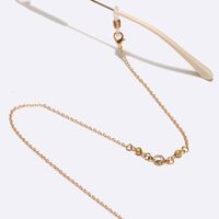 Gold-colored metal non-slip chain, with frosted glass beads, for glasses and masks GL1573
