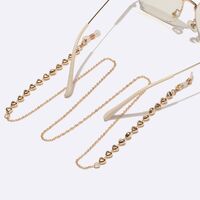 Gold-colored metal non-slip chain, with gold heart, for glasses and masks GL1566