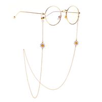 Gold-colored metal non-slip chain, pendant daisy, for glasses and masks GL1032