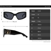 Plastic sunglasses in the shape of a 